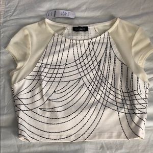 White/cream w/ black/silver detail Bebe crop top